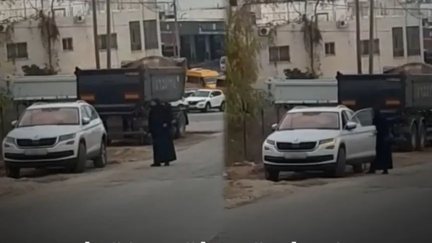 المتسولة تركب سيارتها 