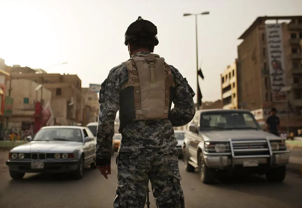مسلحون يستهدفون معهداً بريطانياً وشركة أمريكية في بغداد (فيديو)