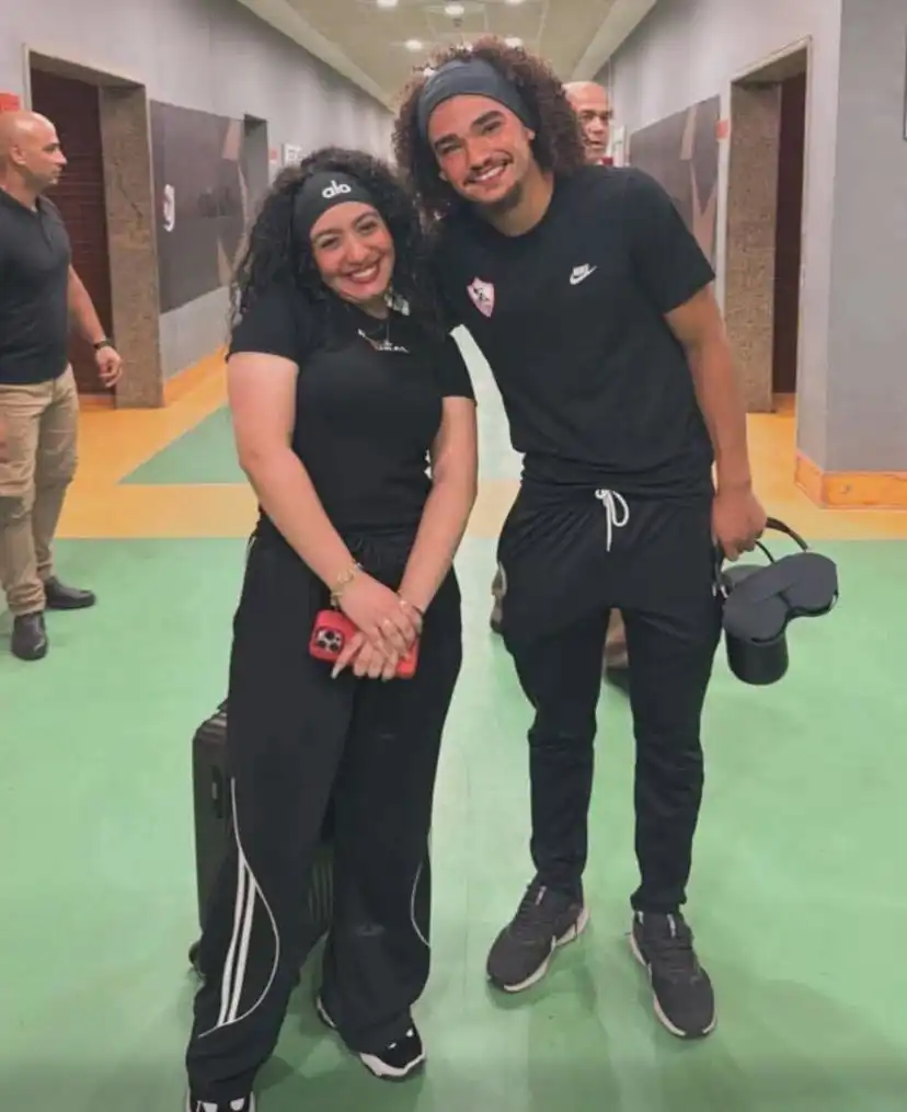 آدم كايد مع مشجعة الزمالك