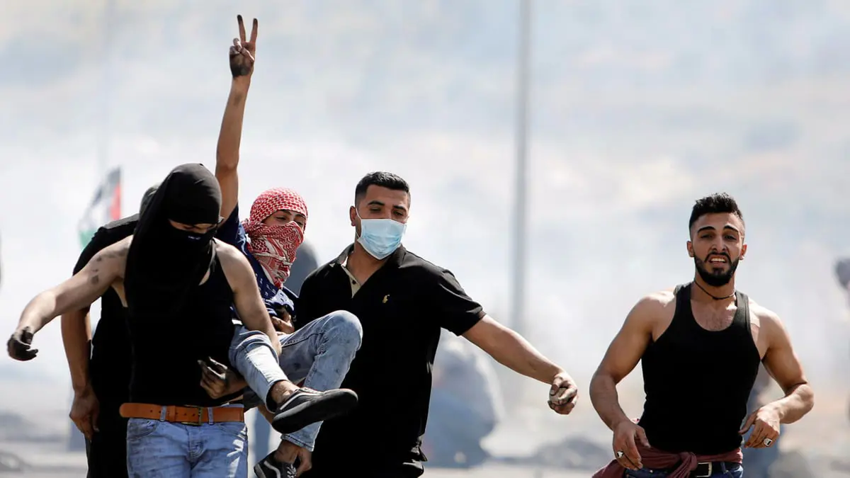 إصابة عشرات الفلسطينيين برصاص الجيش الإسرائيلي خلال مواجهات في نابلس