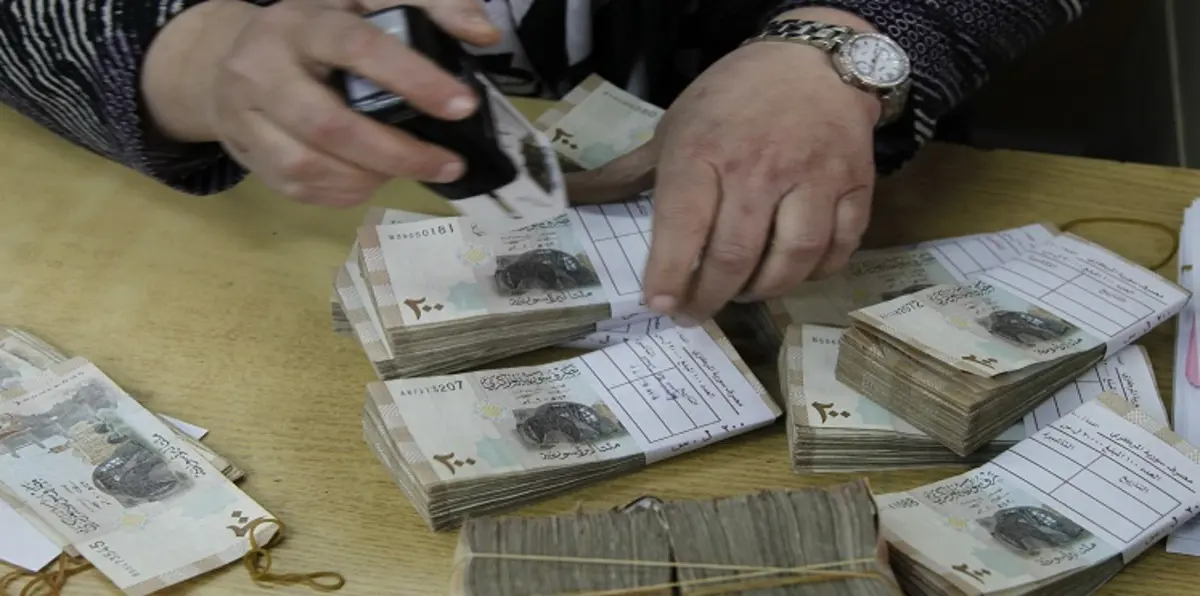 سر "اللمسة السحرية" التي أنقذت الليرة السورية أمام الدولار
