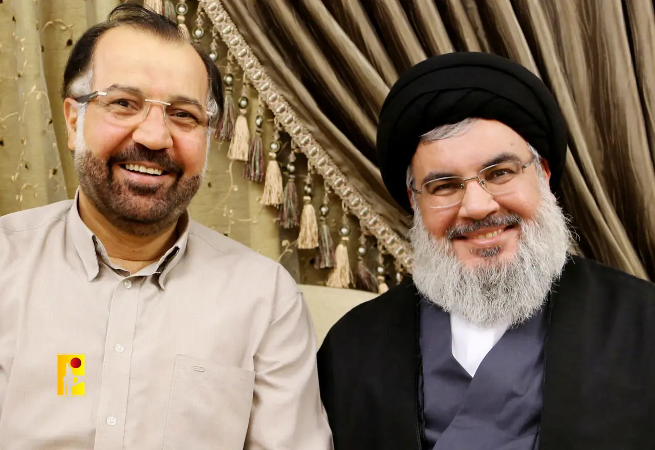القيادي العسكري البارز في حزب الله فؤاد شكر والأمين العام للحزب حسن نصر الله