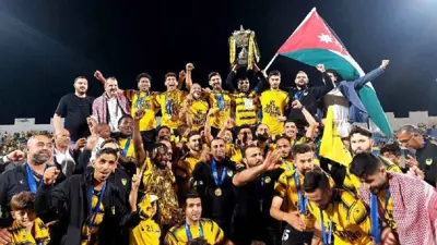 احتفال لاعبي الحسين إربد 