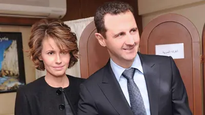 الرئيس السوري السابق بشار الأسد وزوجته أسماء