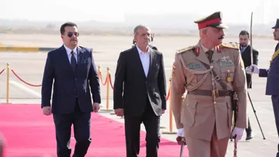 الرئيس الإيراني ورئيس الوزراء العراقي خلال لقاء سابق