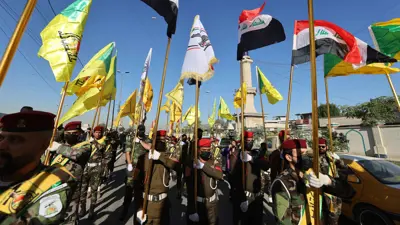رايات عدد من الميليشيات العراقية