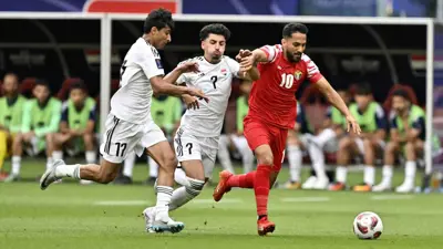 مباراة سابقة بين الأردن والعراق