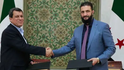 أحمد الشرع ومظلوم عبدي يتبادلان محاضر الاتفاق