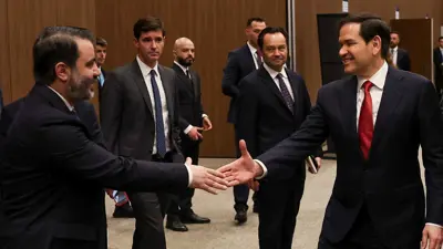 وزير الخارجية الأمريكي ونظيره السوري