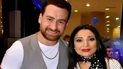 نضال الشافعي وزوجته هند محمد