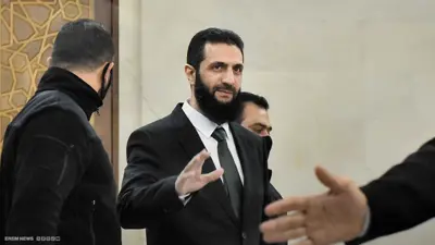  الجولاني بربطة عنق