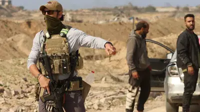 أحد حراس الأمن في موقع توزيع المساعدات بغزة