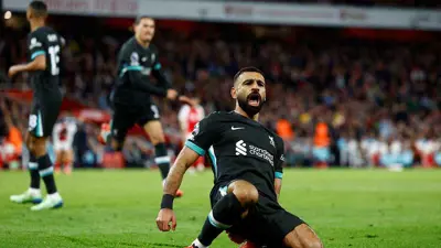 محمد صلاح يحتفل بهدفه في مباراة ليفربول وآرسنال