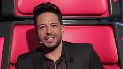 هل أُصيب الفنان محمد حماقي بـ"كورونا" بعد عودته من The Voice Kids؟ 