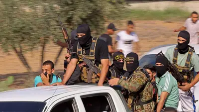 مسلحون من حركة الجهاد الفلسطينية يوم هجوم السابع من أكتوبر 2023 