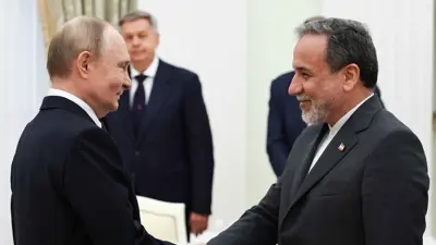فلاديمير بوتين وعباس عراقجي