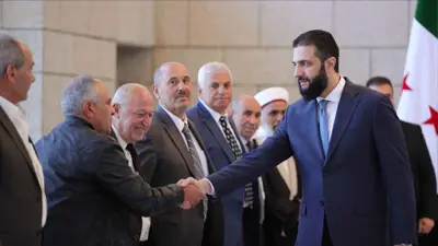 الرئيس السوري خلال لقاء وفد من السويداء
