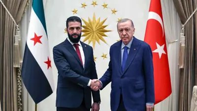 أردوغان يدعو الشرع لمعاقبة الخارجين عن القانون
