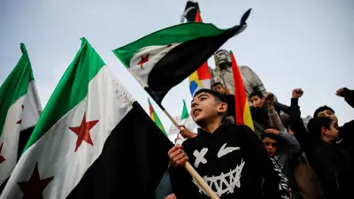 سوريون يحتفلون بسقوط الأسد