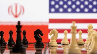 قطع الشطرنج أمام علمي إيران والولايات المتحدة