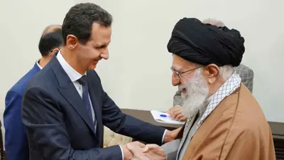 الأسد وخامنئي في لقاء سابق
