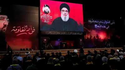 نصر الله يخاطب غبر شاشة في بيروت خلال تأبين فؤاد شكر