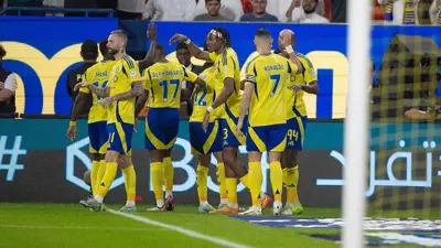 محمد سيماكان مع لاعبي النصر