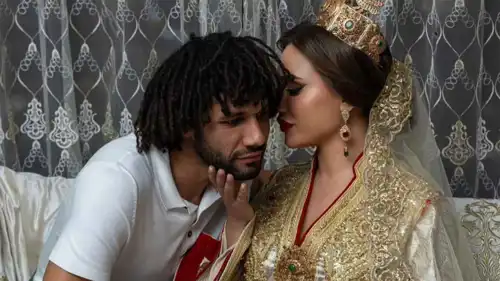 محمد النني وزوجته المغربية حنان